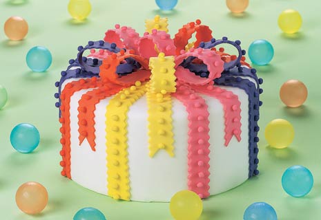 brightwithwhitecake white cake with colorful fondant